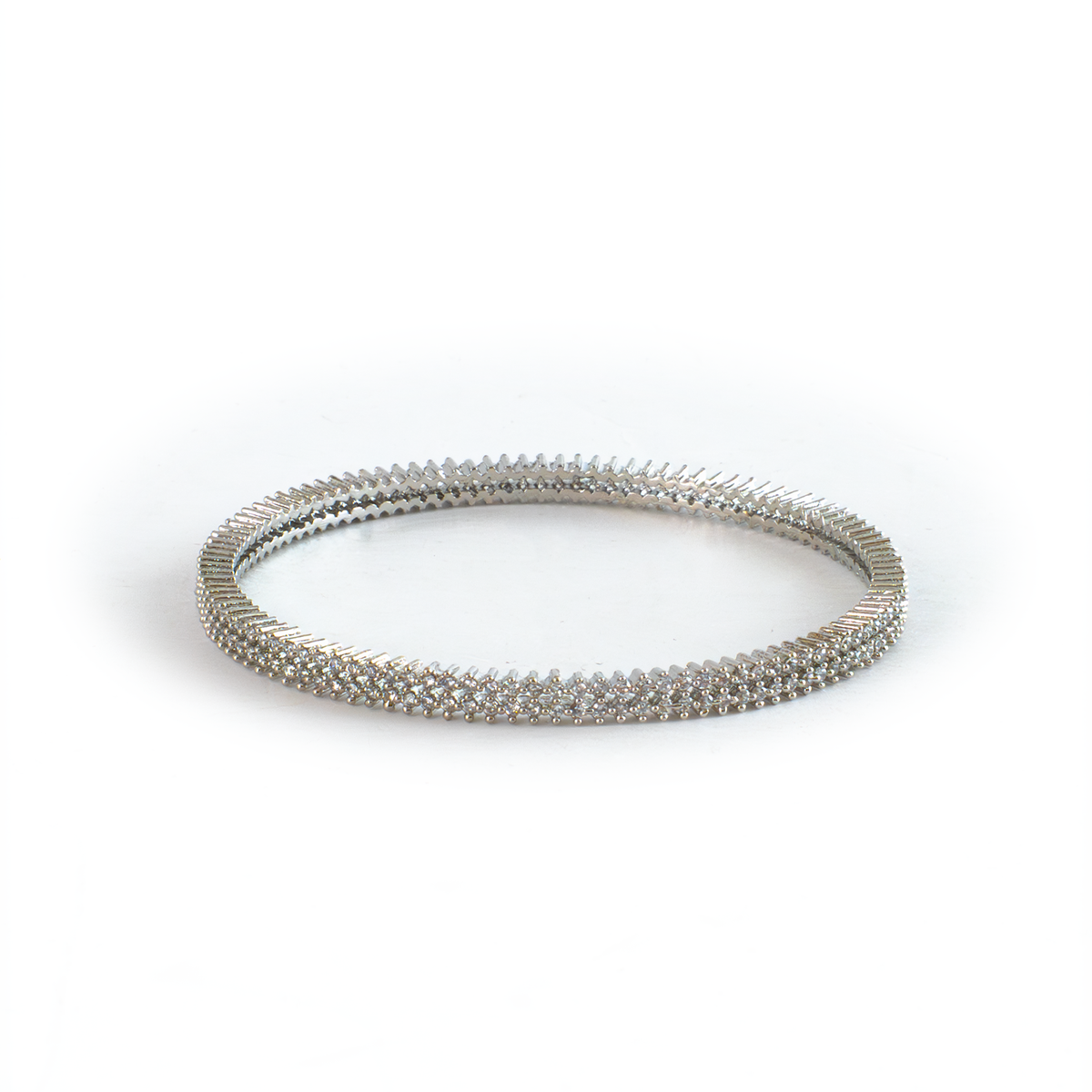 Two-Line Zirconia bangles in silver plated finish with cubic zirconia (CZ) stones – view 3 of 4
