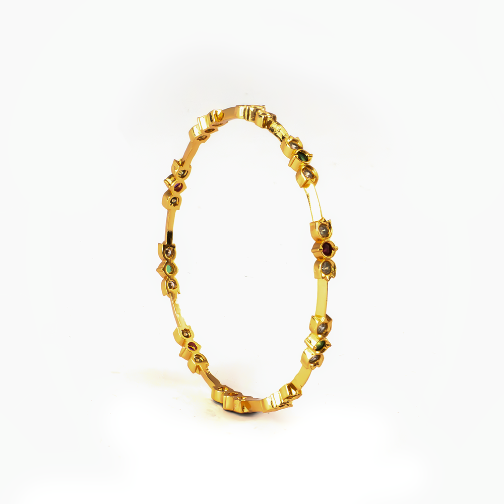 Minimalist Ruby & White AD bangles in 24K gold plated finish with ruby & white American diamond (AD) stones