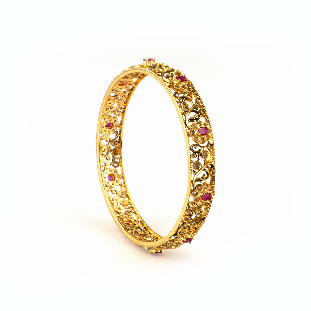 Ruby & Emerald Stone bangles in 24K gold plated finish with ruby & emerald-green stones