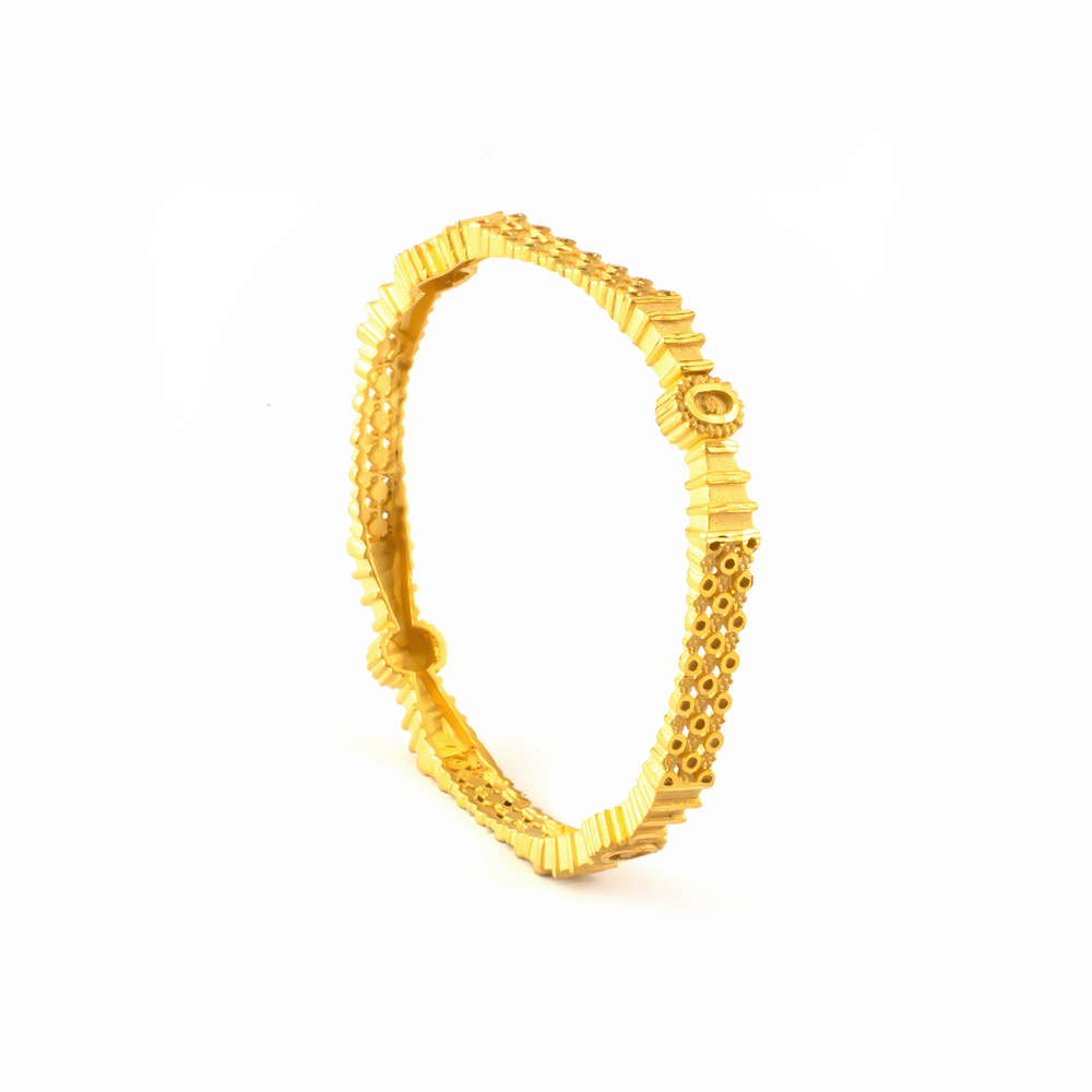 Forming Everyday Elegance bangles in 22K gold plated finish